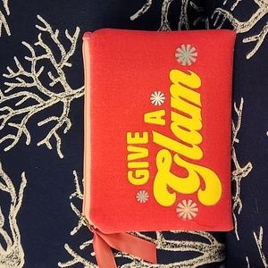 Give A Glam Benefit zippered cosmetic bag